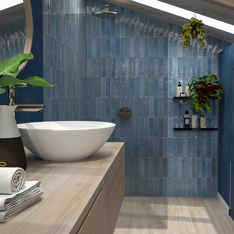 artisan blu (dark blue) subway style effect wall tile in a bathroom.